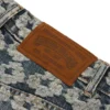 Bol Kesim Jakarlı Çelenk Desenli Denim Pantolon